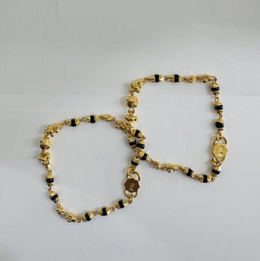 22KT GOLD PAIR OF BABY BRACELETS 5.6GM