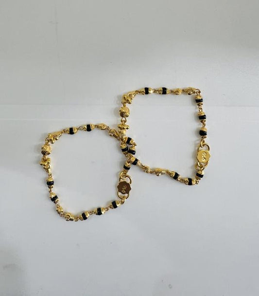 22KT GOLD PAIR OF BABY BRACELETS 5.6GM